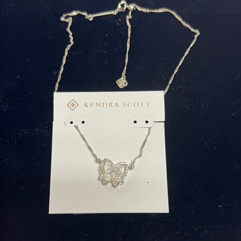 Kendra Scott Silver Mother of Pearl Bow Necklace Reversible to silver bow